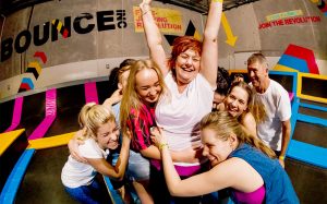 Photo of group hugging and having fun