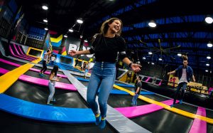 Photo of woman smiling and jumping in Free-Jump