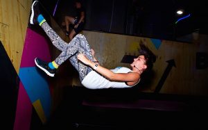 Photo of a girl wallrunning