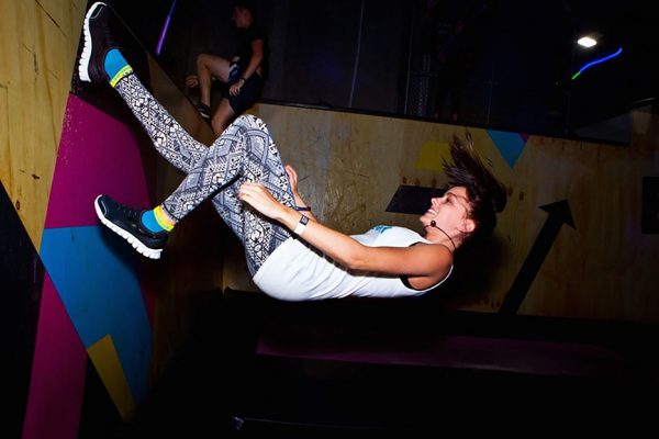 Photo of a girl wallrunning
