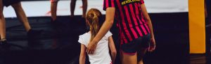 Photo of staff member with kid