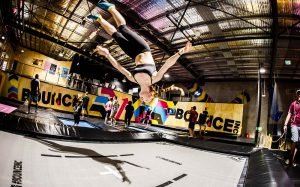 Photo of a woman doing a flip on the SuperTramp