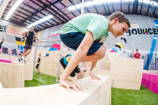 Photo of boy doing parkour in X-Park