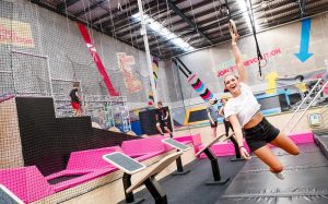 Photo of woman using the rings in X-Park