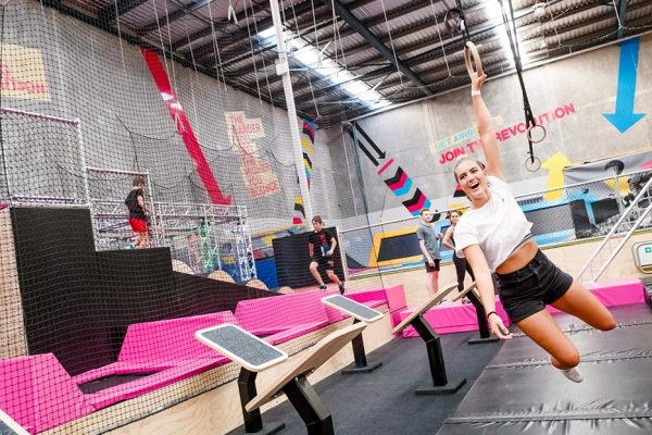 Photo of woman using the rings in X-Park