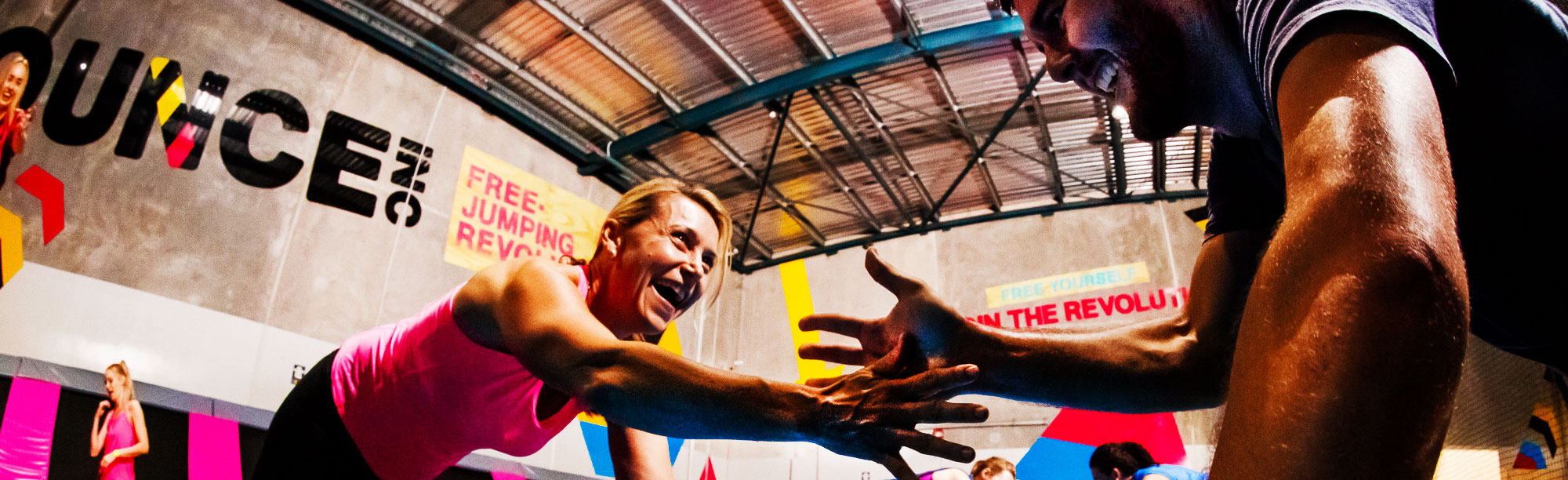 Photo of a lady and man doing BOUNCE FIT