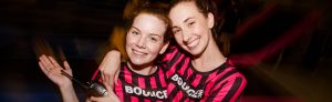 Photo of two happy staff