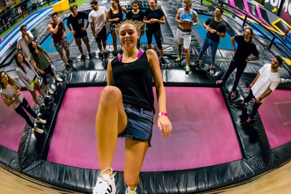 Photo of a woman running the wall