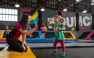 Photo of a staff member and child for KinderGym