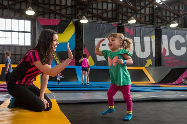 Photo of a staff member and child for KinderGym