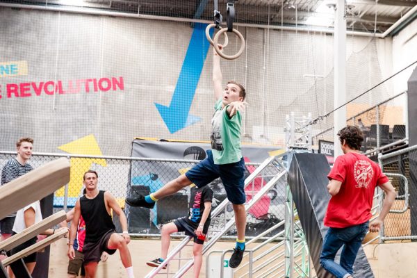 Photo of kid using rings in X-Park